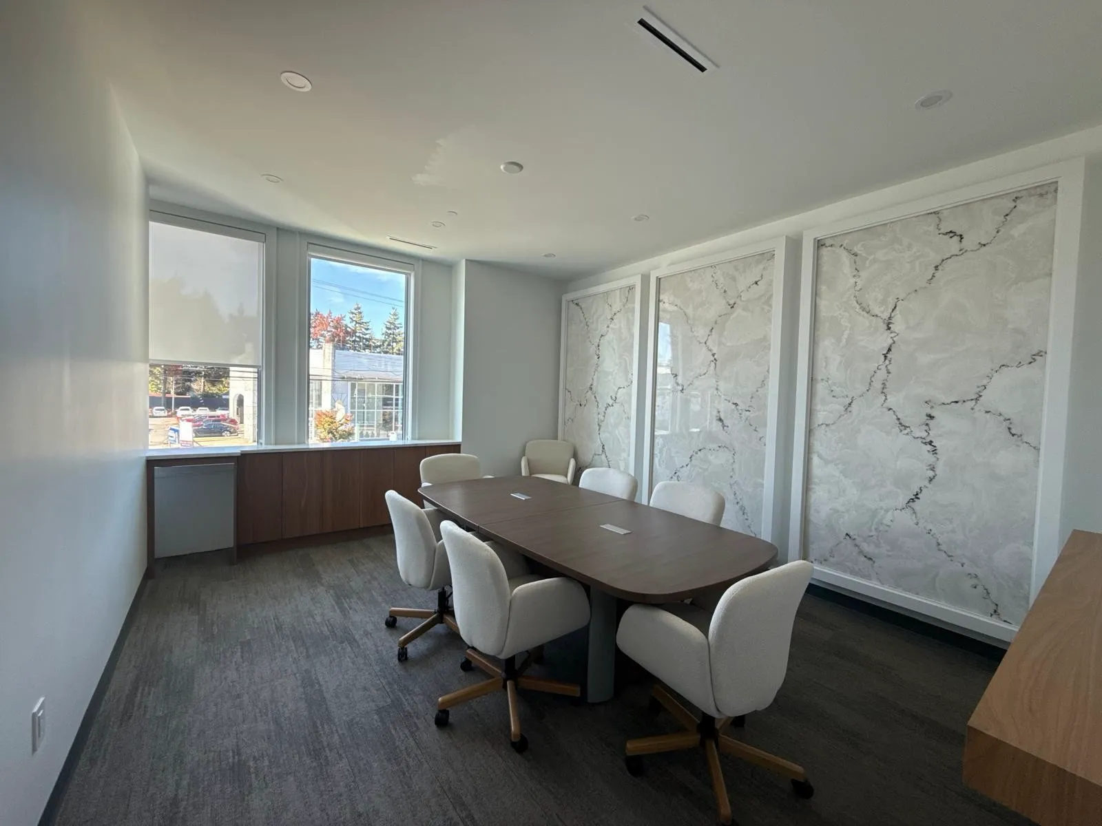 The meeting room at Premier Law Corporation in Surrey, with a boardroom table seating six